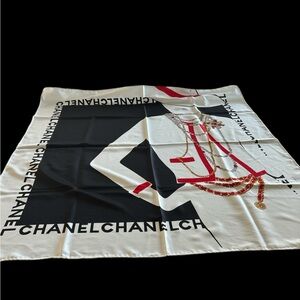 CHANEL Monochrome Scarf with Red Accents